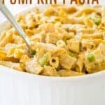 Penne with pumpkin cream sauce in a casserole dish with text overlay that says "Baked Pumpkin Pasta".