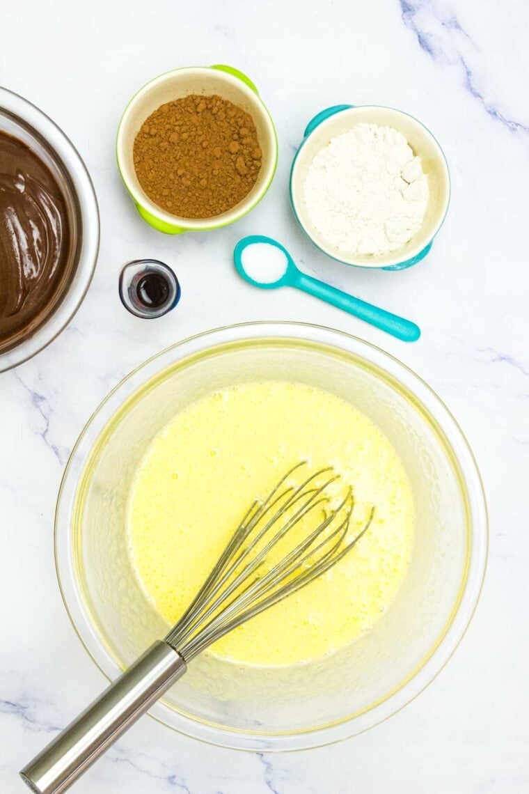 Sugar and eggs whisked together until pale yellow.