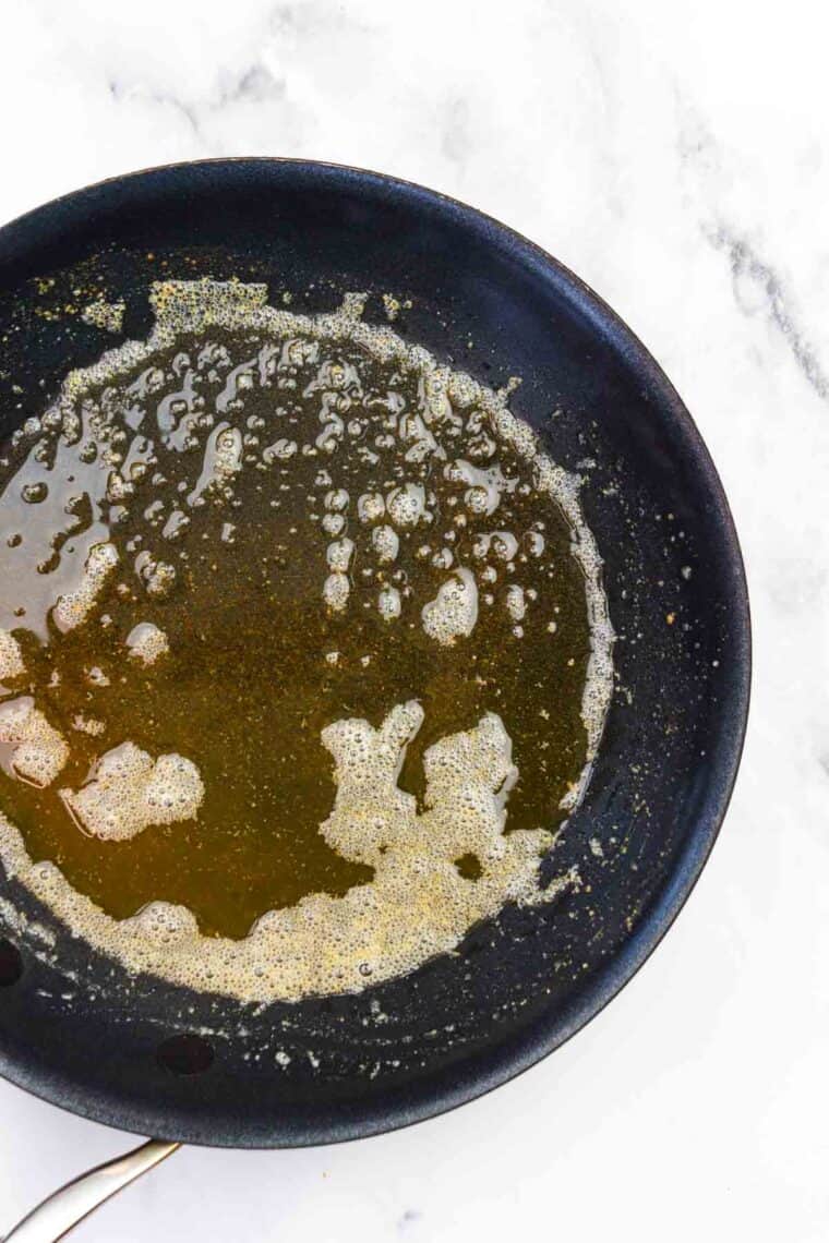 Browned butter in a skillet.