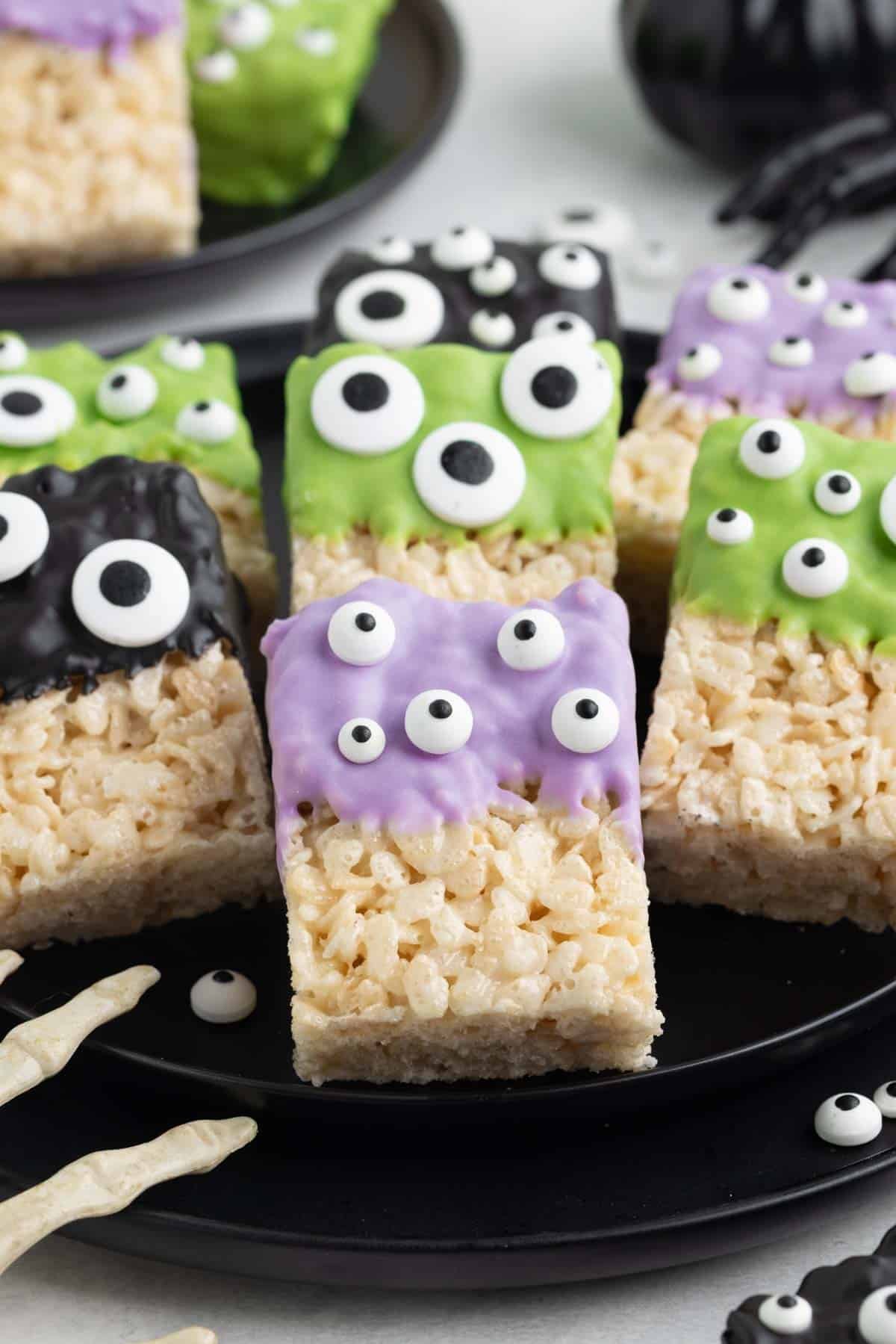 Monster Rice Krispies treats on a plate.