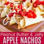 A platter of apple slices topped with cream cheese and peanut butter drizzles and strawberry sauce and a hand picking one up divided by a green box with text overlay that says "Peanut Butter & Jelly Apple Nachos" and the words easy, kid favorite, and fun.