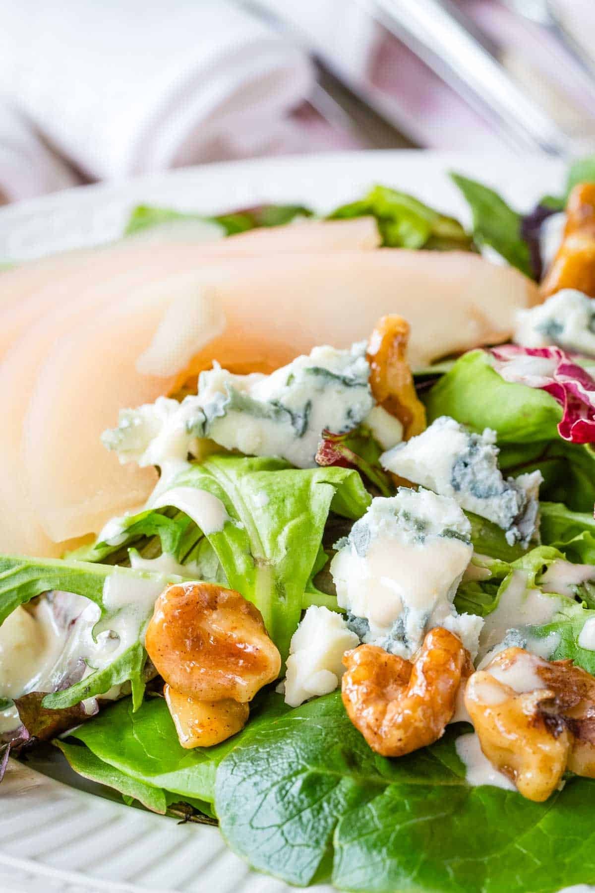 Close-up image of poached pear salad.