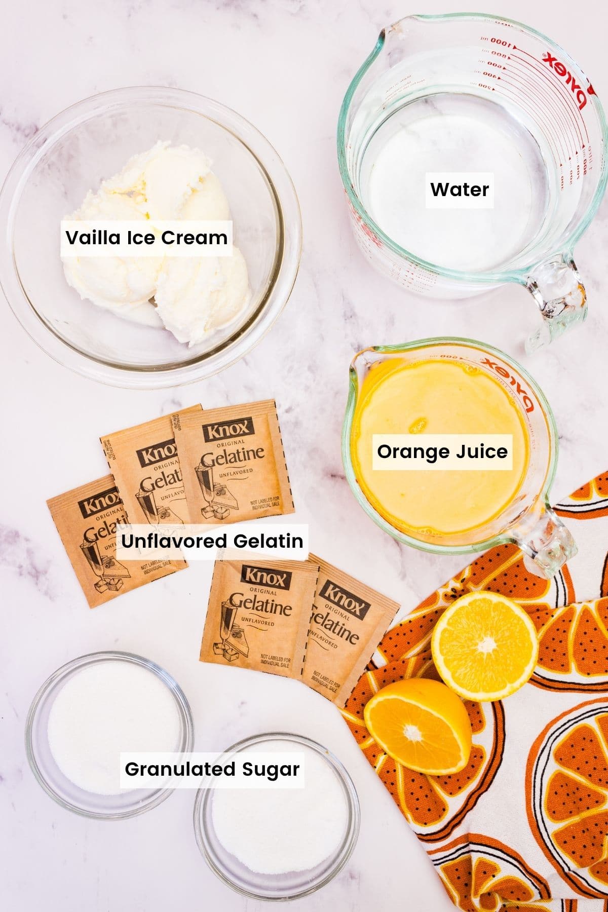 Labeled ingredients for creamsicle jello mold.