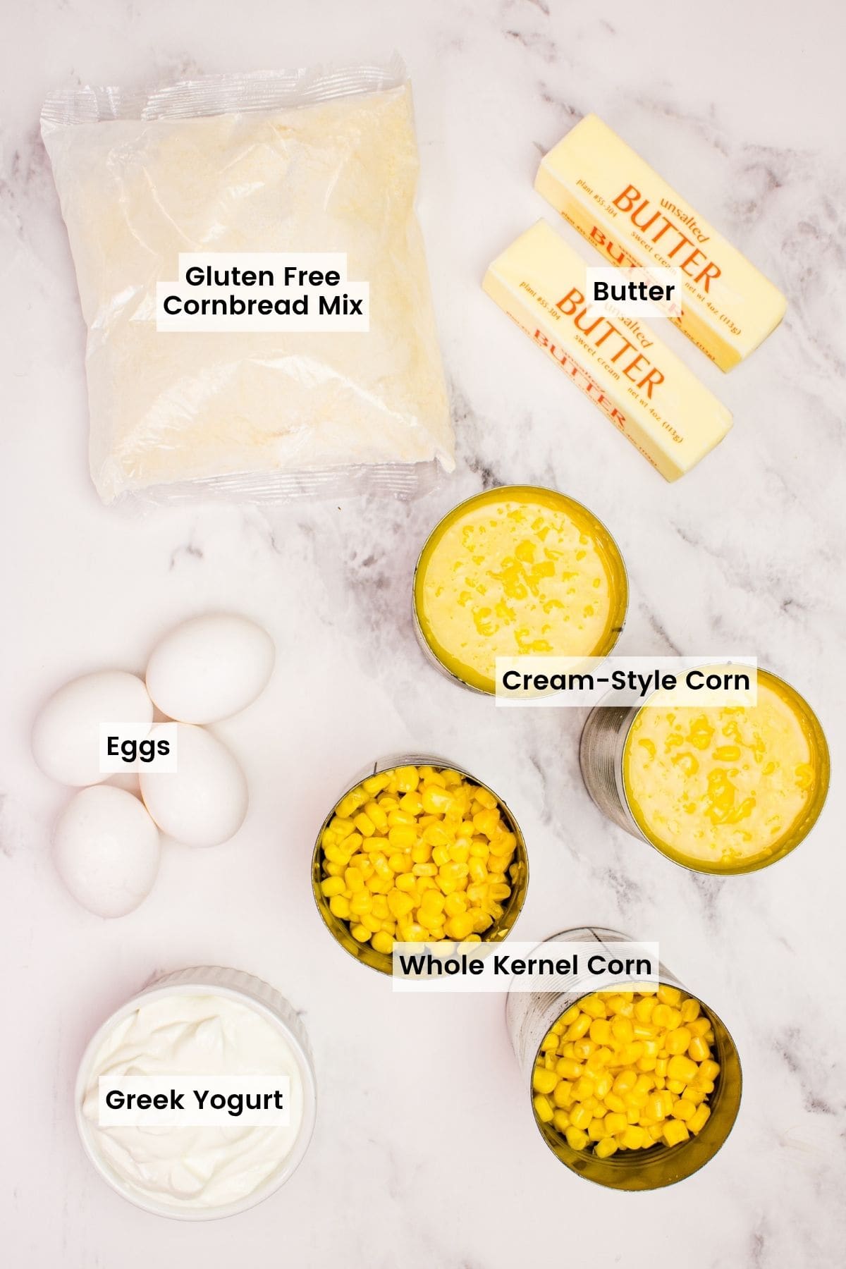 This wildly easy gluten-free corn casserole combines sweet and savory goodness with a creamy texture that’s guaranteed to be a hit. labeled ingredients for gluten free corn casserole.