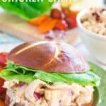 Chicken salad on a bun with text overlay that says "Honey BBQ Chicken Salad".