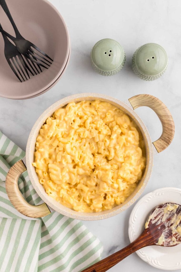 This gluten-free mac and cheese is so creamy and satisfying, with a crunchy breadcrumb topping that takes it over the edge! Mac and cheese in a pot.