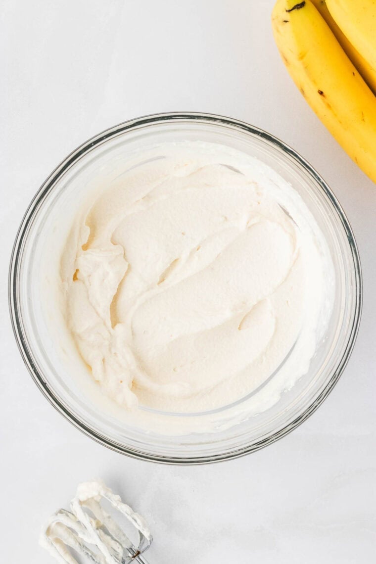 Whipped cream in a mixing bowl.