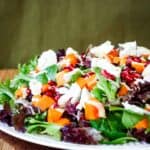 Butternut squash salad served on a plate.