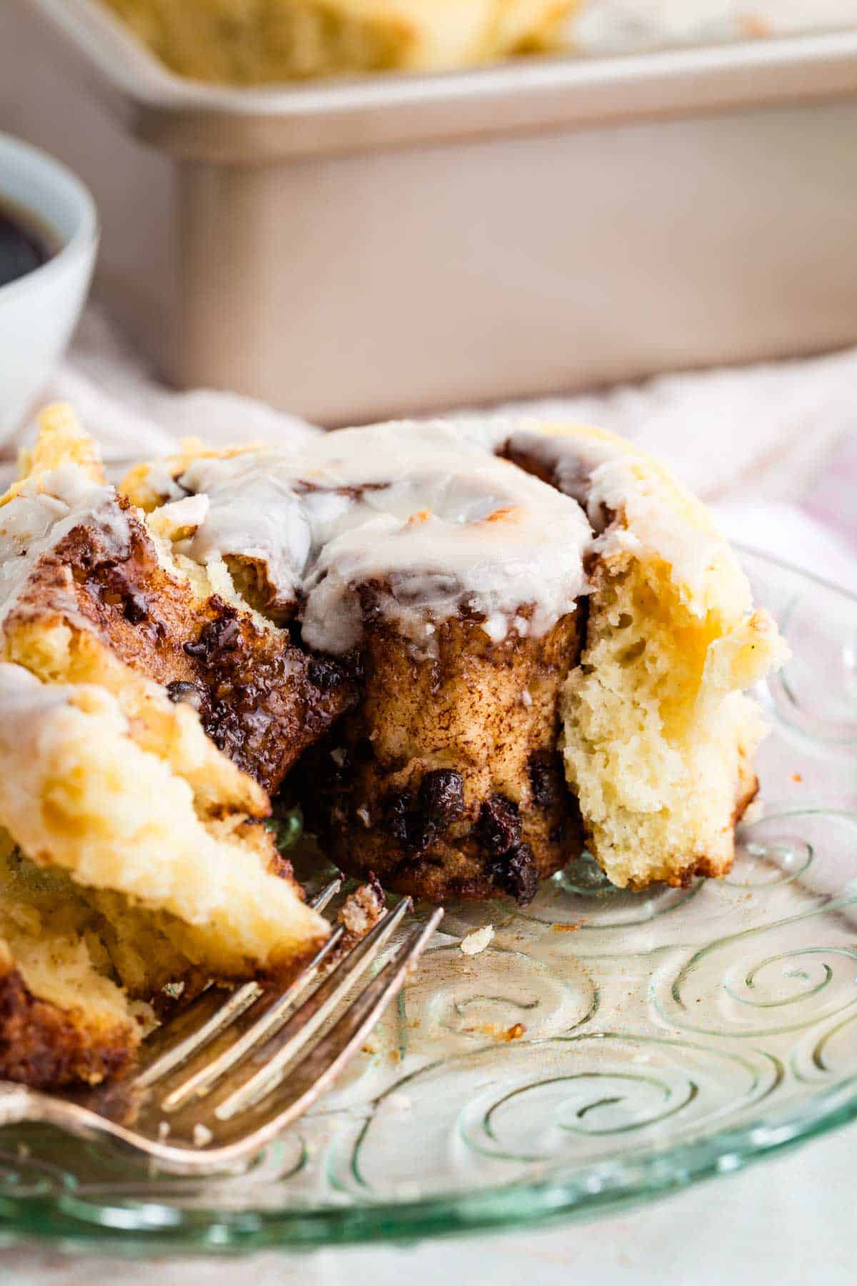 Close-up of the gooey center of a gluten-free chocolate cinnamon roll.