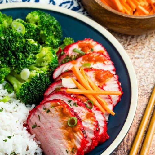 A plate of sliced Char Siu pork tenderloin