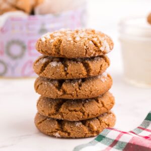 Five gluten free ginger snaps in a stack.