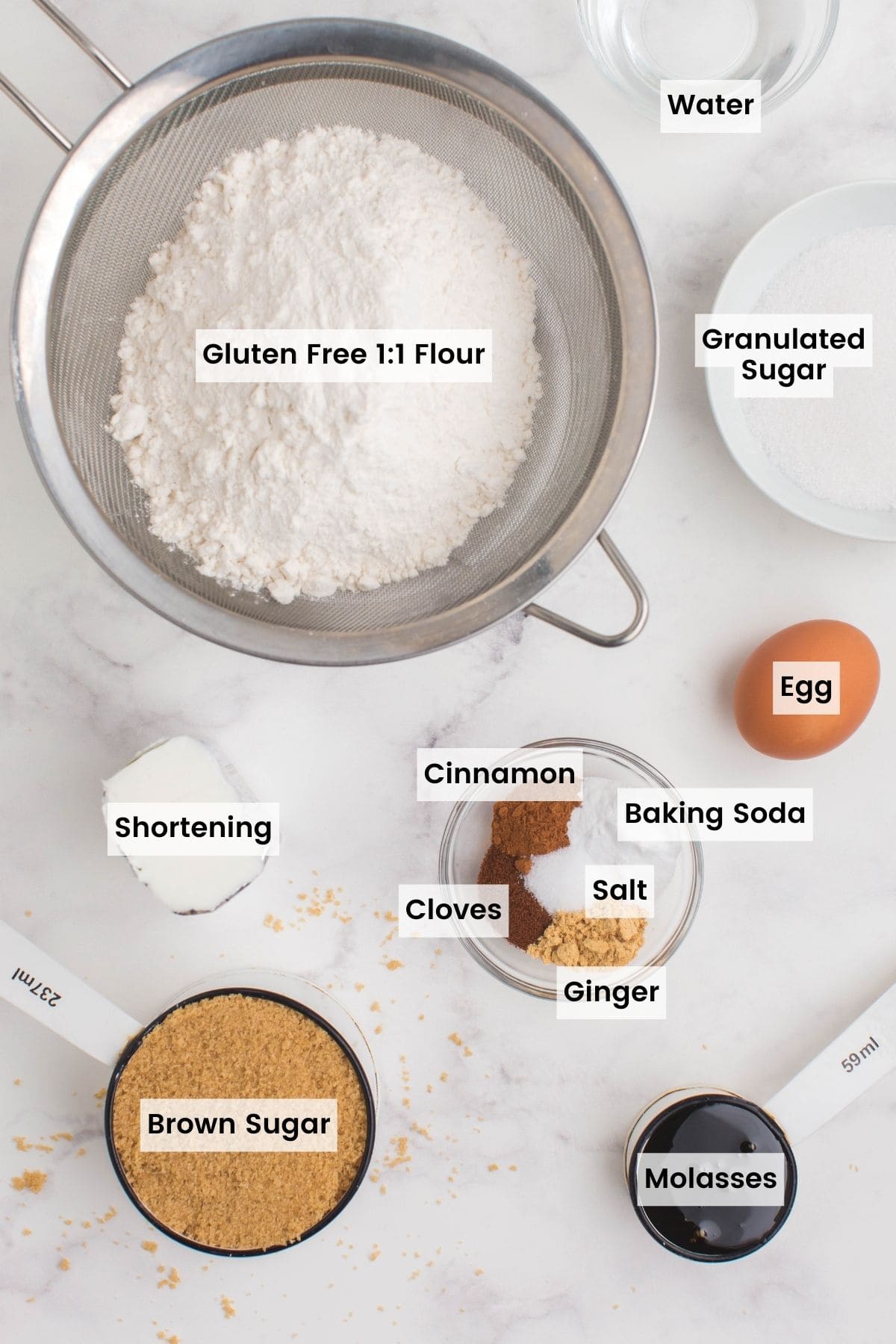 Labeled ingredients for making gluten free ginger snap cookies.