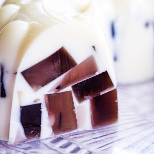 A closeup of the jello mold where slices have already been cut and removed.