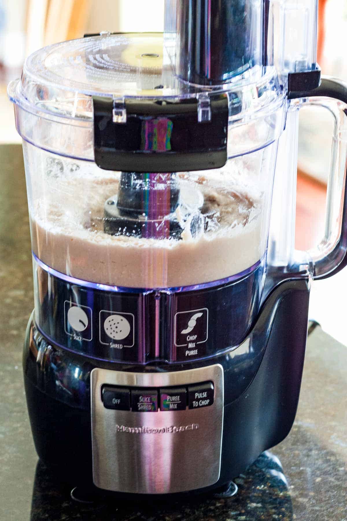 Hummus in a food processor.