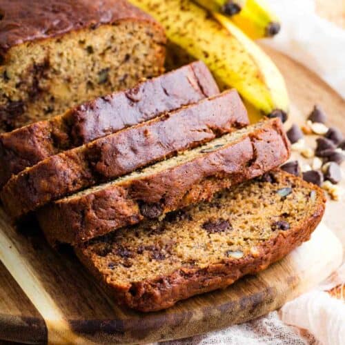 Overhead view of a sliced loaf of chocolate chip banana bread