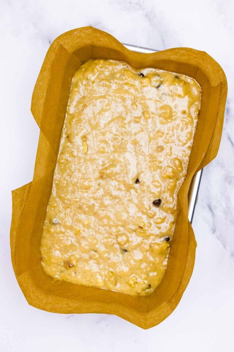 Chocolate chip banana bread batter in a loaf pan