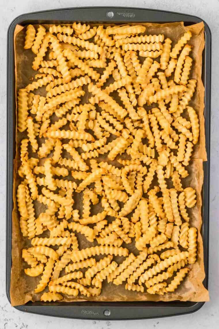 Baked fries on a baking sheet