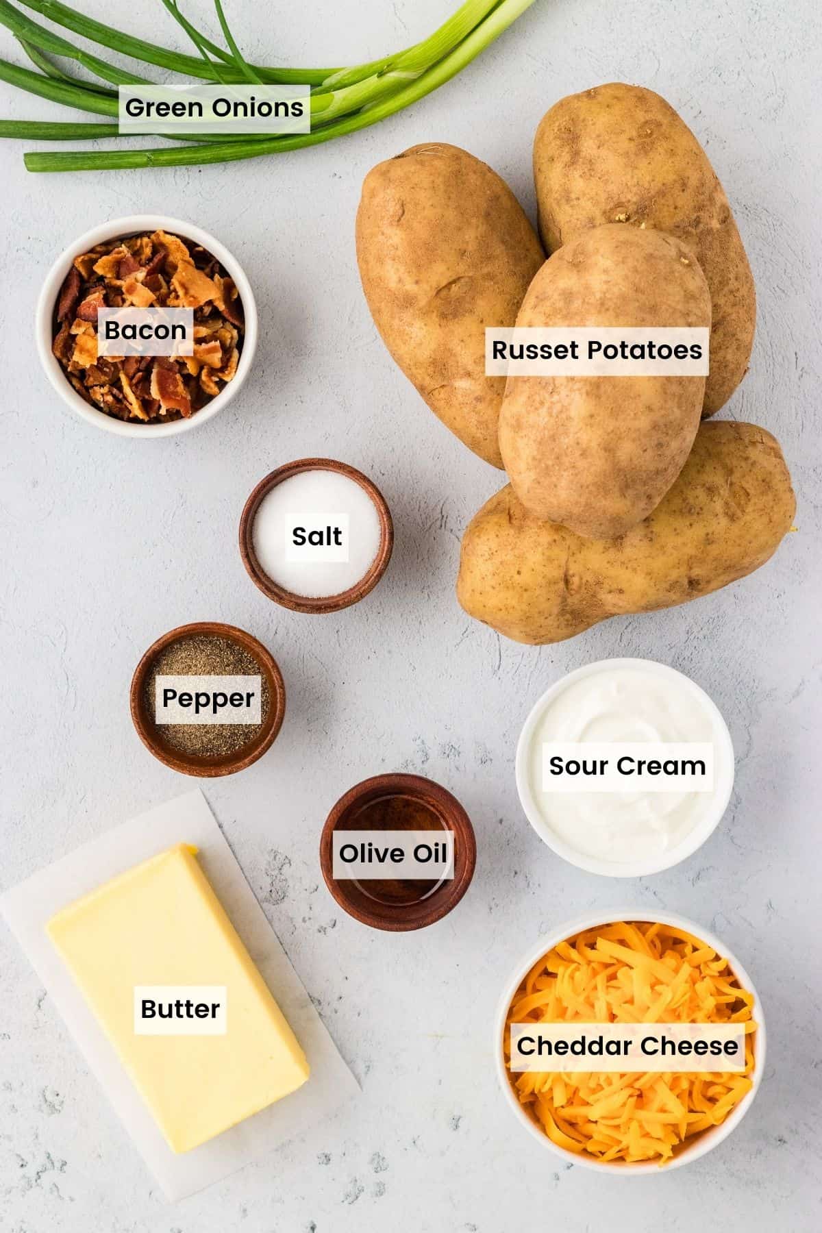 Overhead view of ingredients needed to make loaded baked potatoes