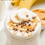 A smoothie in a glass jar with text overlay that says "Peanut Butter Smoothie".