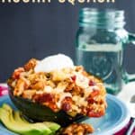 A roasted acorn squash half filled with chili with text overlay that says "Chili Stuffed Acorn Squash".