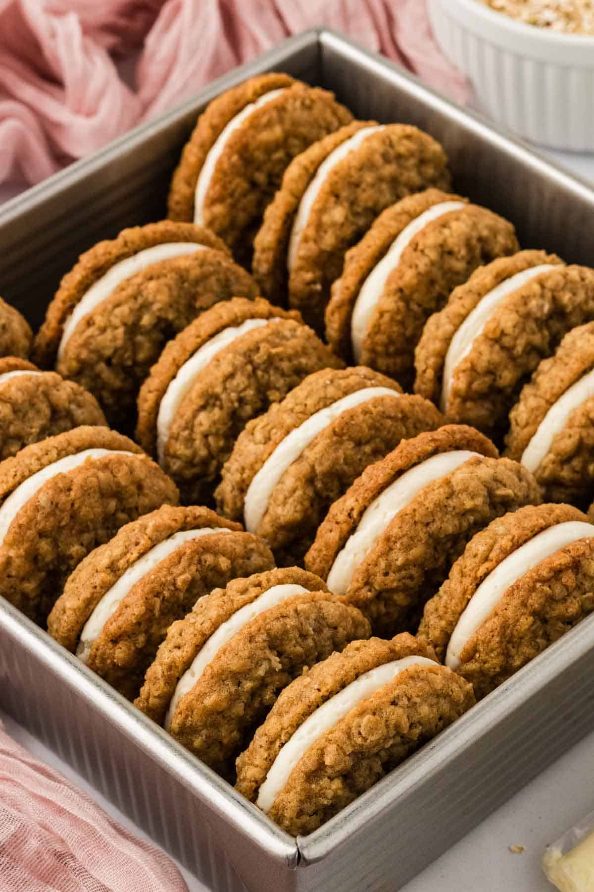 Oatmeal cream pies in a baking dish on their side