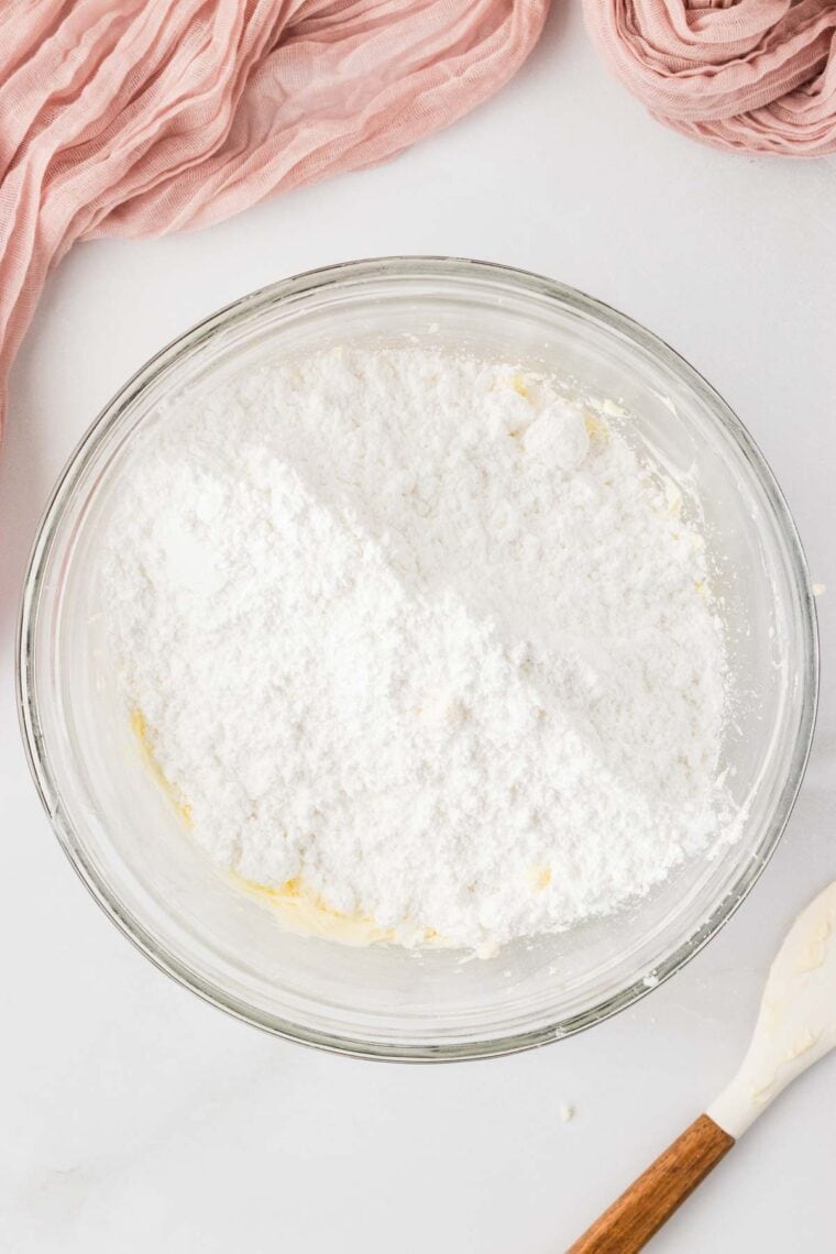 Powdered sugar added to whipped butter