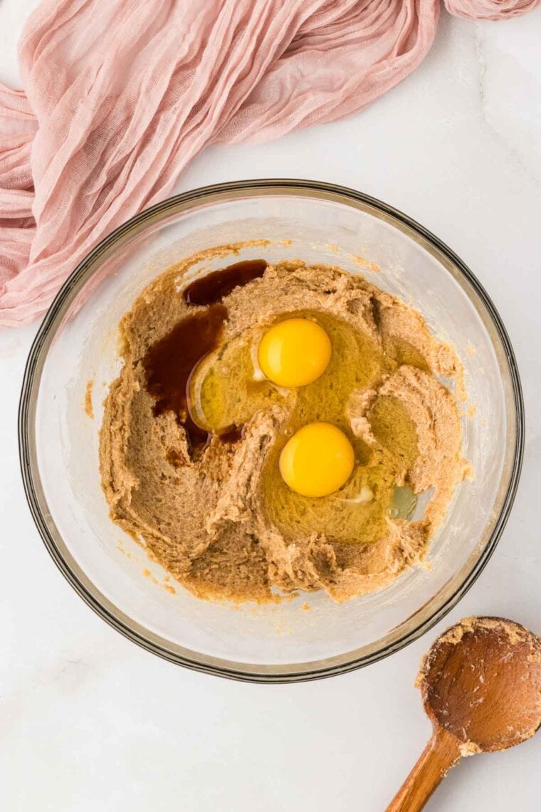 Eggs and vanilla added to creamed butter and sugar