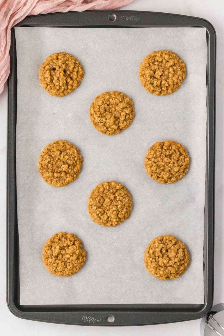 Baked oatmeal cookies on a baking sheet