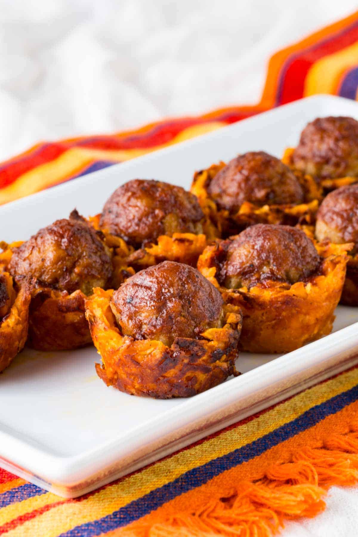 A platter of barbecue meatball sweet potato bites.