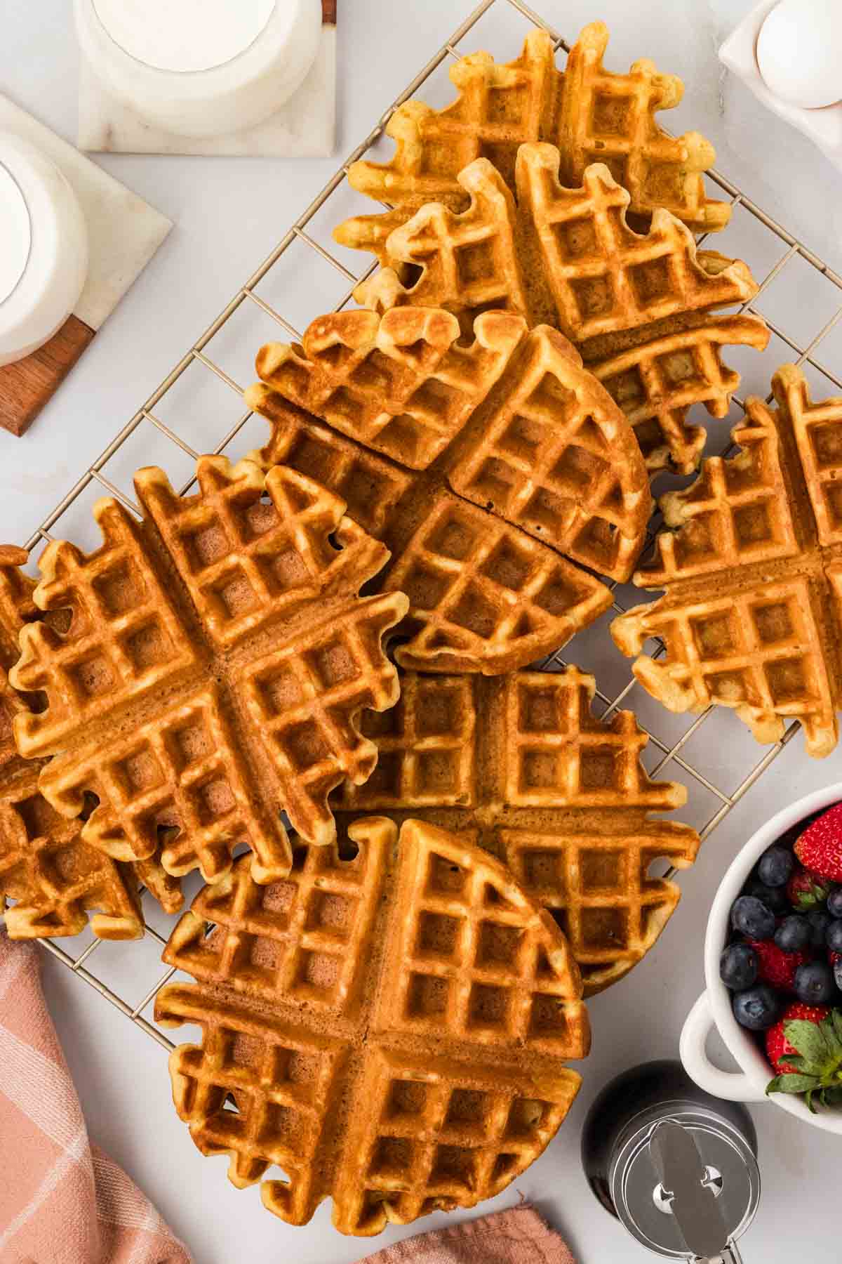 Overhead view of gluten free buttermilk waffles on the counter