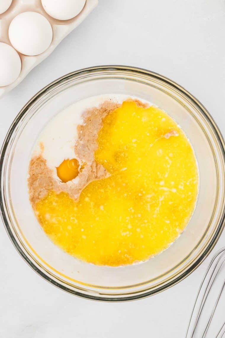 Buttermilk, butter, eggs, and vanilla in a bowl