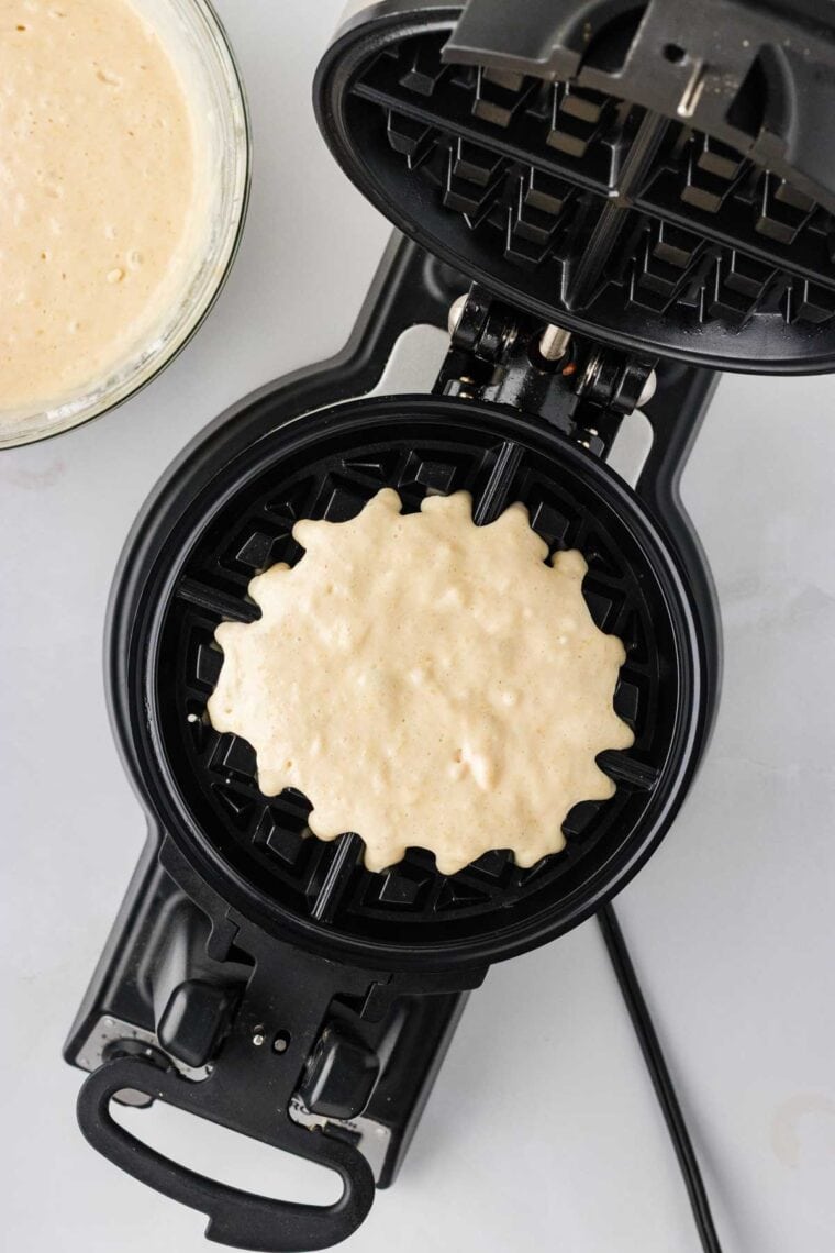 Waffle batter in a waffle iron