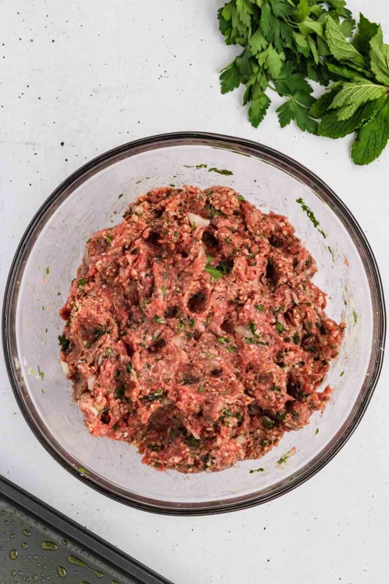 Greek meatball mixture in a bowl