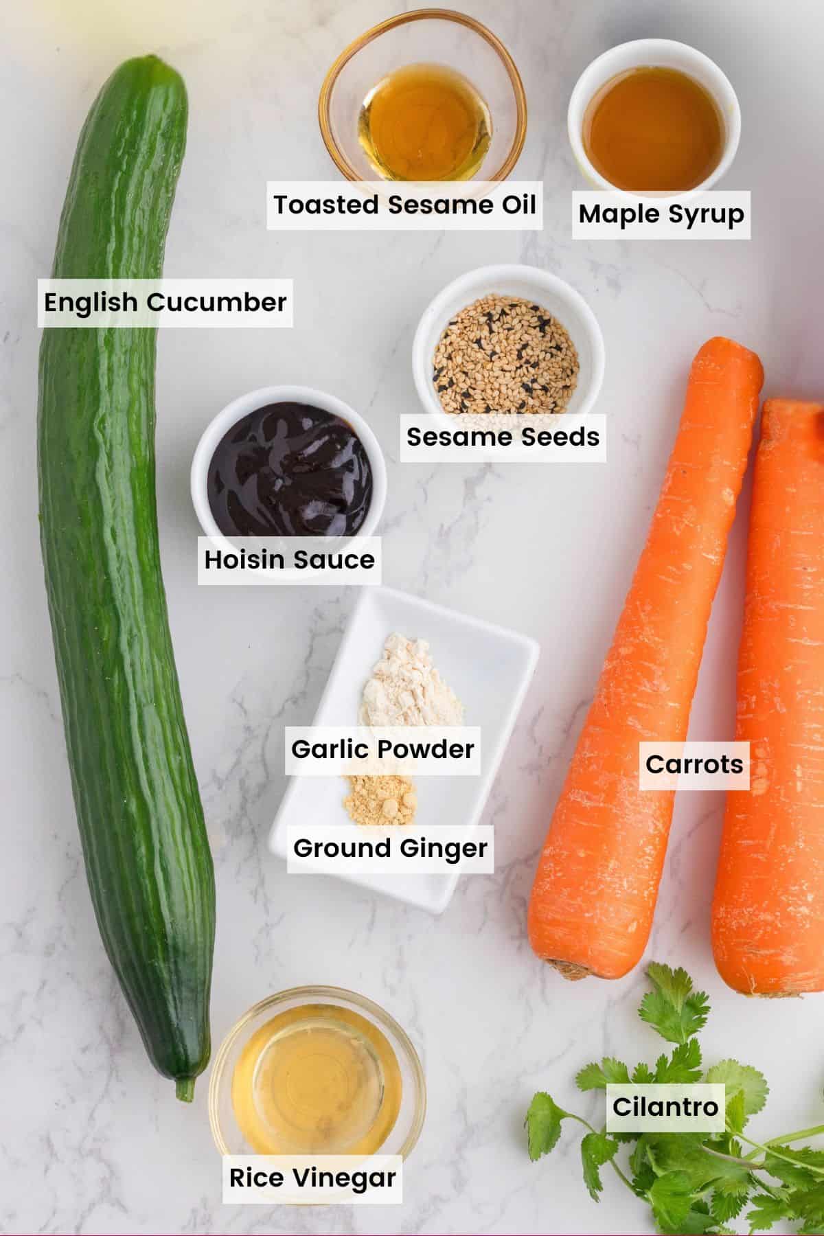 Labeled ingredients shot to make Asian carrot cucumber salad