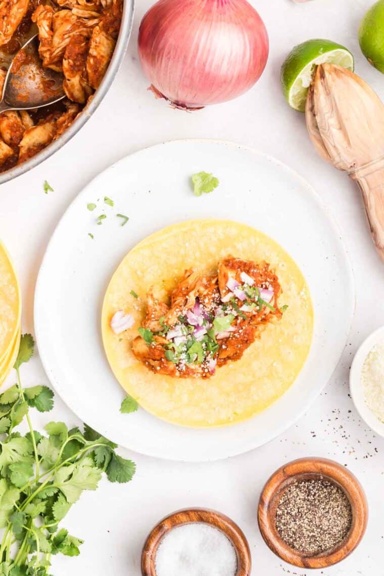 Overhead view of an assembled chicken tinga taco