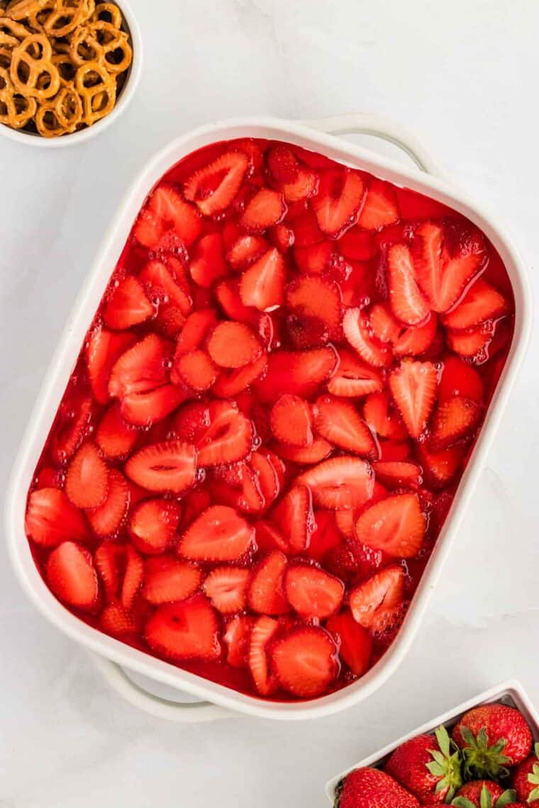 Overhead view of a baking dish of strawberry pretzel salad