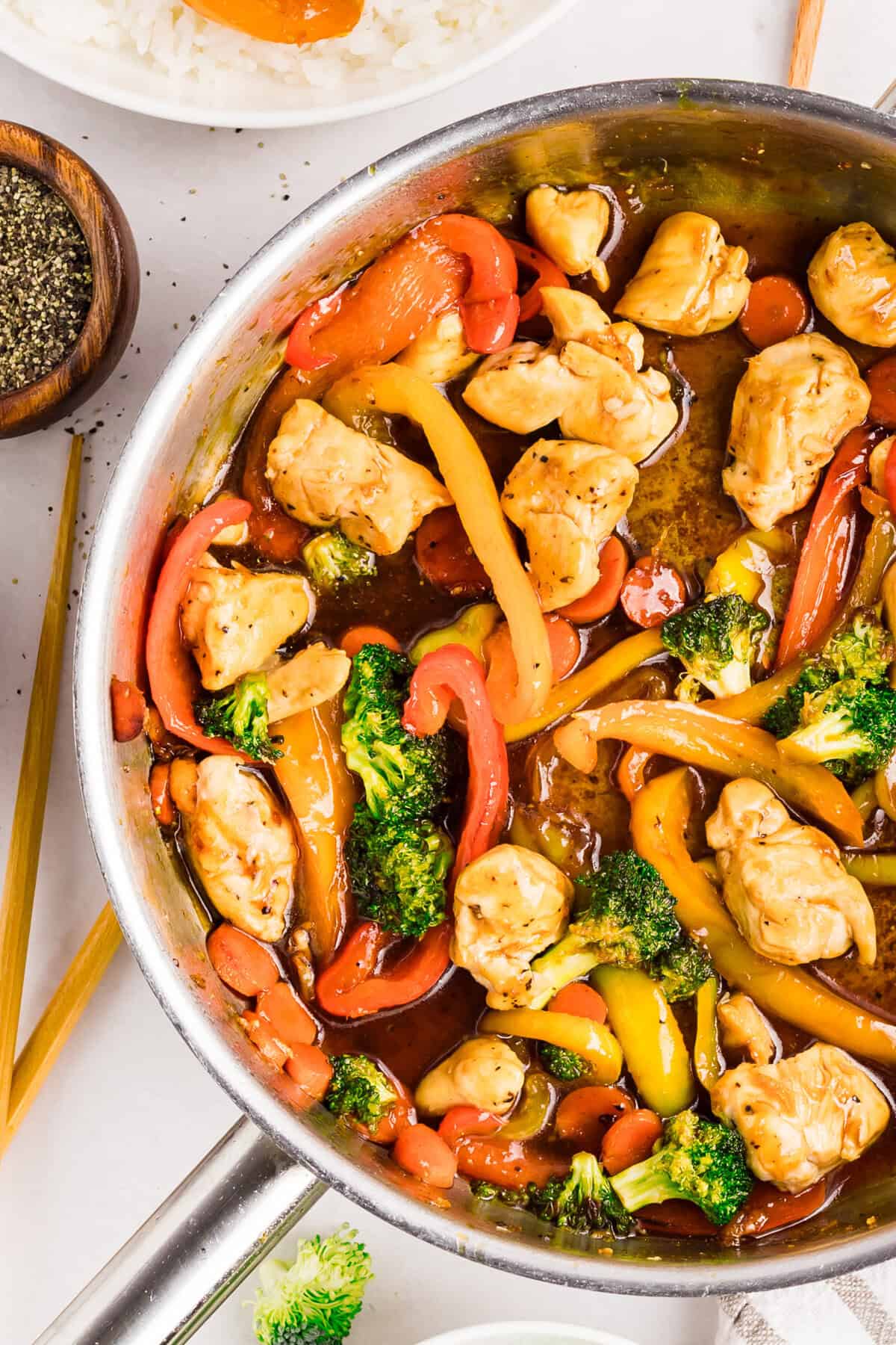 Overhead view of chicken stir fry in a pan