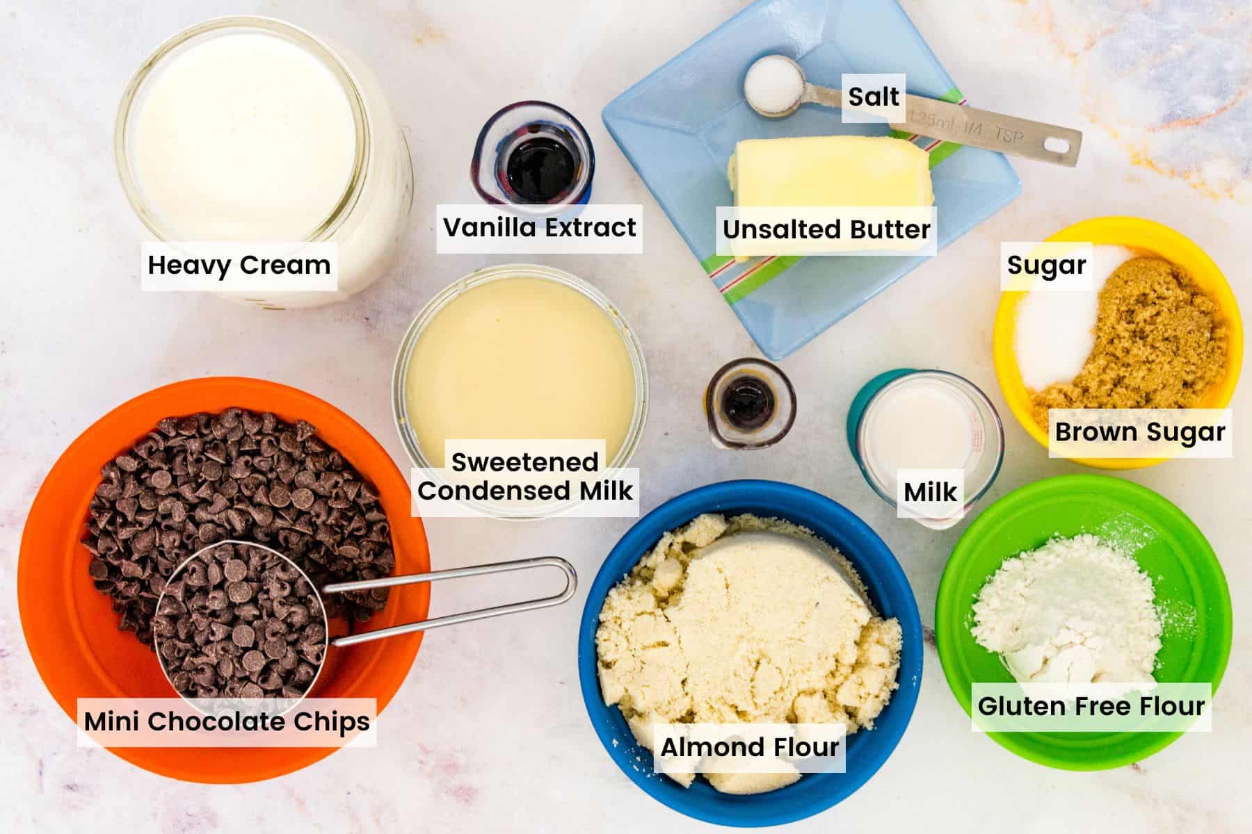 This homemade chocolate chip cookie dough ice cream is 100% gluten free! A creamy no-churn ice cream recipe loaded with edible cookie dough. The ingredients for gluten free chocolate chip cookie dough ice cream with text labels.