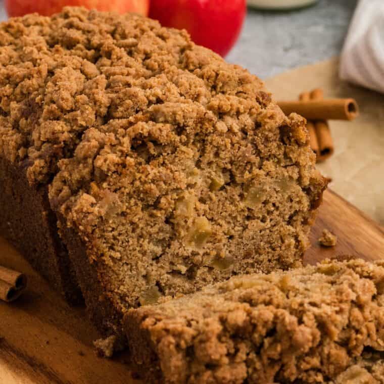 Close up of gluten free apple bread with one piece sliced