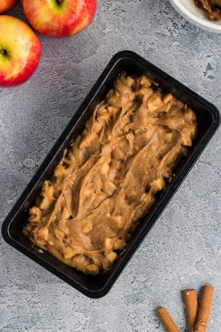 Apple bread batter in a loaf pan