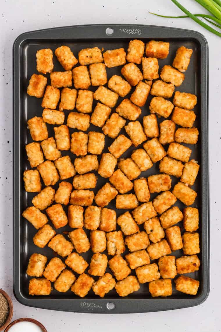 Tater tots on a baking sheet