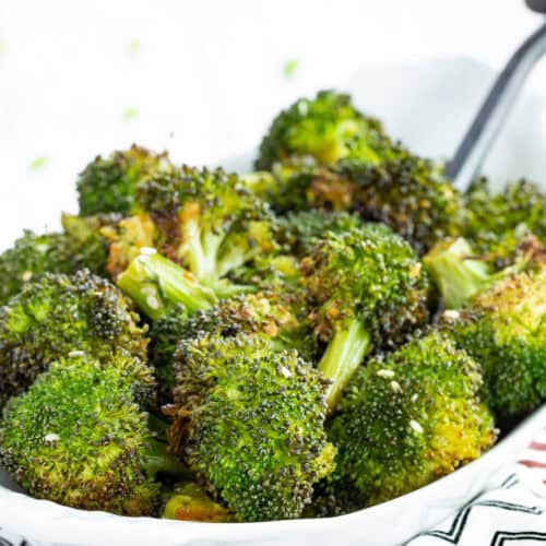 Sesame maple broccoli in an oval serving dish.