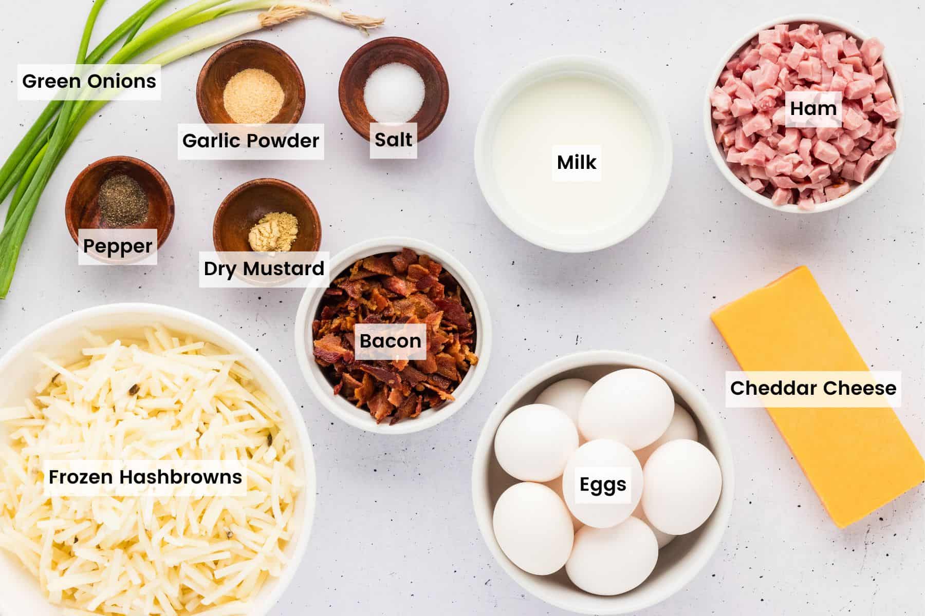 Overhead view of ingredients needed to make crockpot breakfast casserole
