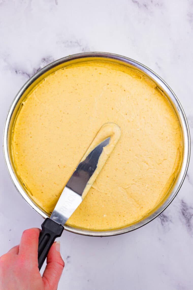 With a graham cracker crust and fluffy pumpkin filling, this gluten free no-bake pumpkin cheesecake is an easy fall dessert. Spreading the pumpkin cheesecake filling into a smooth layer