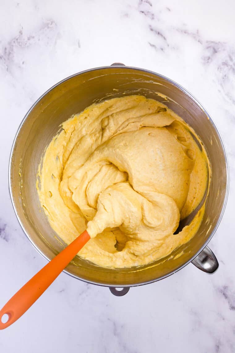 With a graham cracker crust and fluffy pumpkin filling, this gluten free no-bake pumpkin cheesecake is an easy fall dessert. Pumpkin cheesecake filling in a bowl